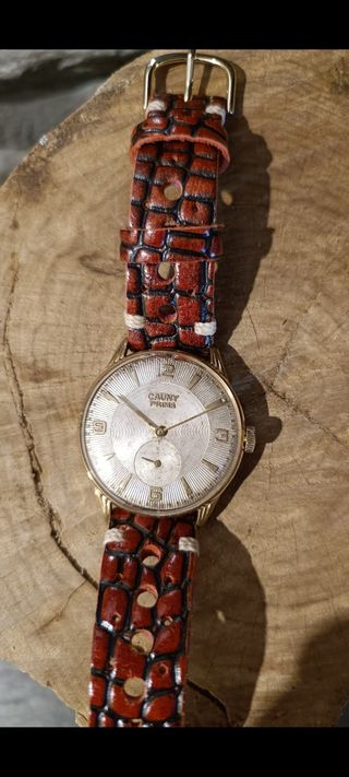 RELOJ  CAUNY PRIMA ORO JUMBO.