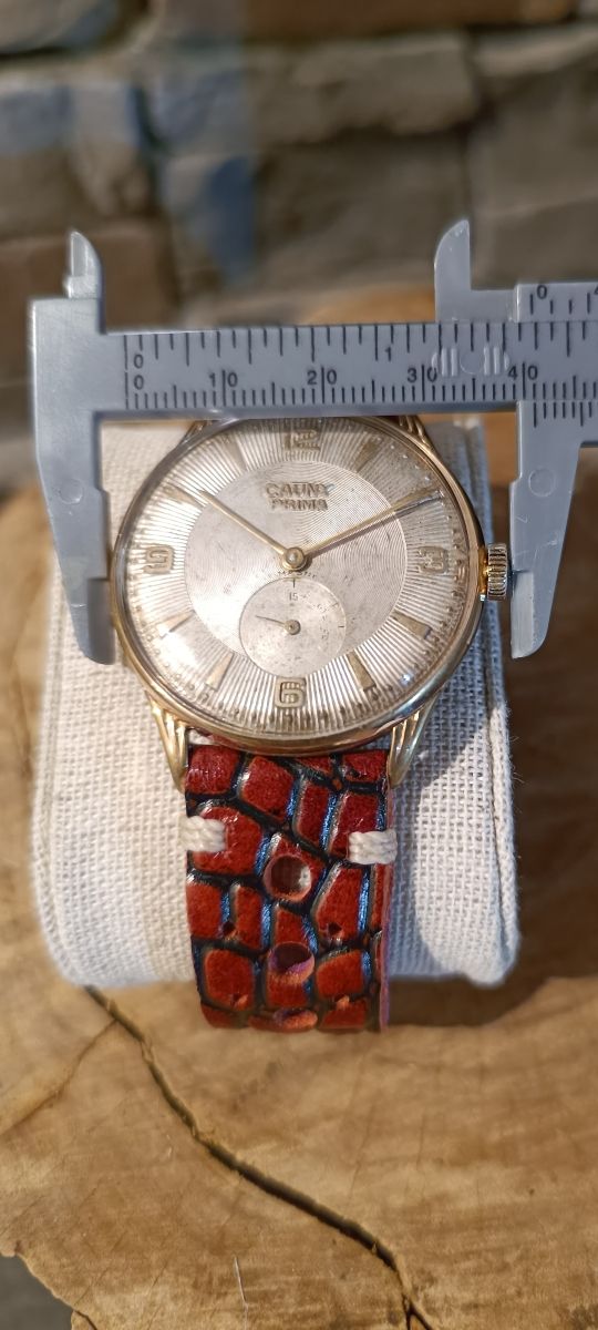 RELOJ CAUNY PRIMA ORO JUMBO.