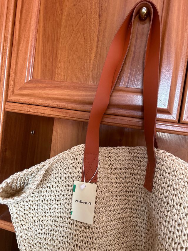 Bolso firma “Natura”