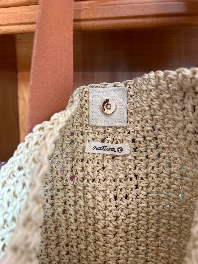 Bolso firma “Natura”
