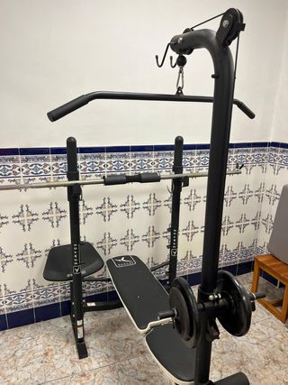 Máquina multifunción y mancuernas