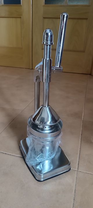Exprimidor metálico