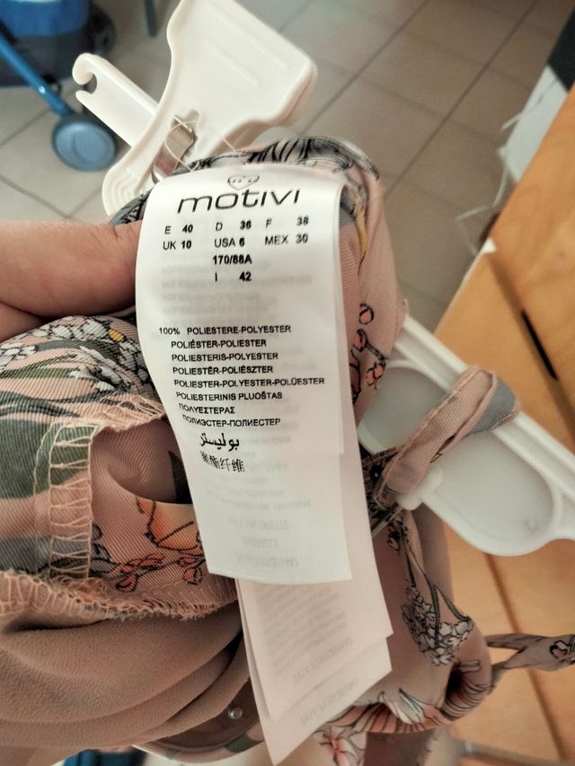 Tuta elegante motivi