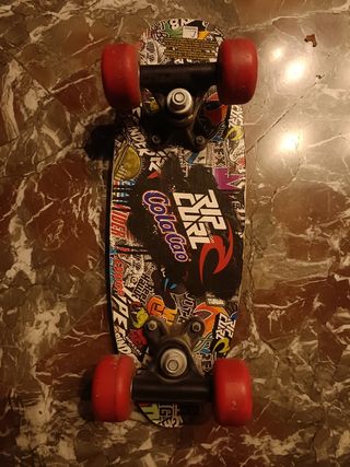 Mini monopatín  (patinete)
