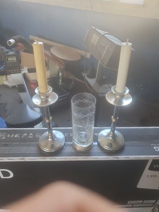 Candelabros con jarrón para flores