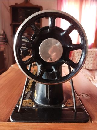 Maquina de coser Singer con mueble