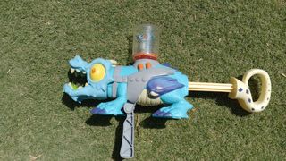 Pistola juguete animal azul monstruo