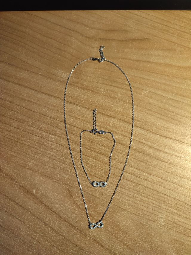 Collana e braccialetto con simbolo infinito