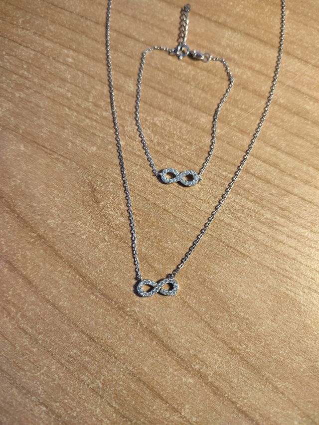Collana e braccialetto con simbolo infinito