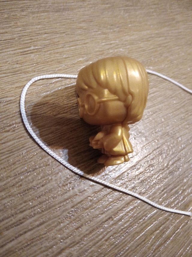 Funko kinder joy Harry dorado