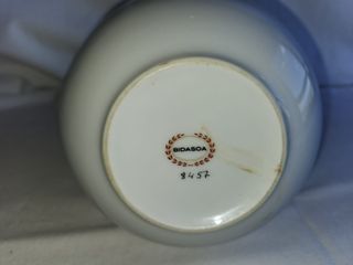 Conjunto de jarra y 3 platos de porcelana Bidasoa