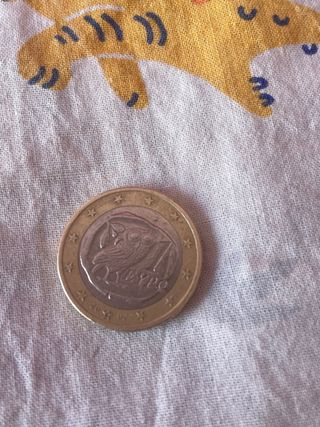 Moneda del búho de la suerte