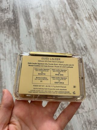 Espejo Estee Lauder dorado