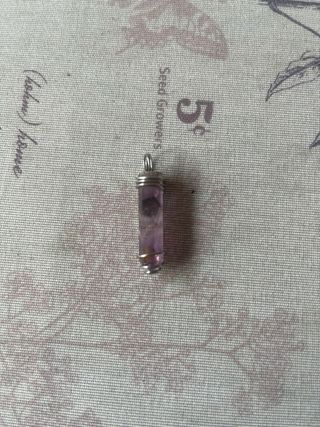 Colgante de minerales y acero inox 