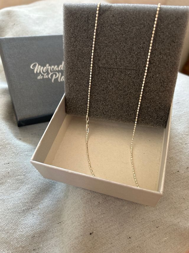 Colgante y cadena de plata