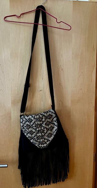 Bolso bandolera de tejido y piel vuelta