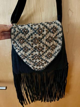 Bolso bandolera de tejido y piel vuelta