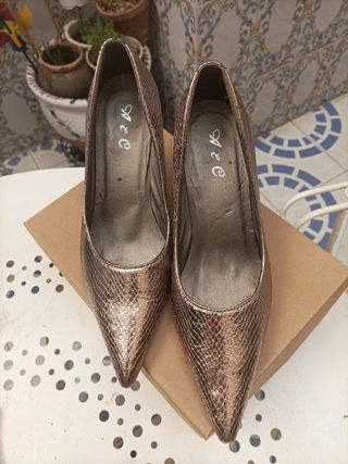 Zapatos nuevos piel serpiente