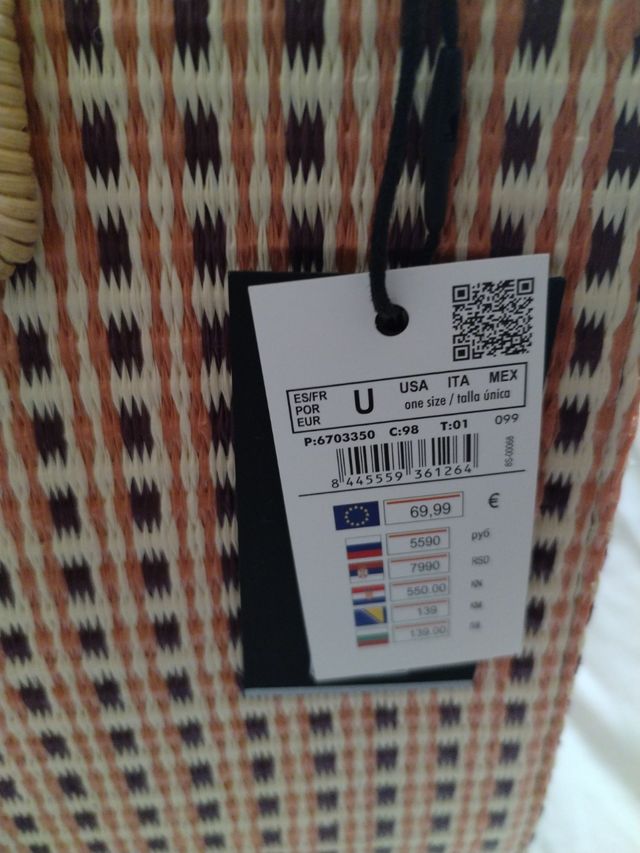 bolso  de mano y bandera cortefiel