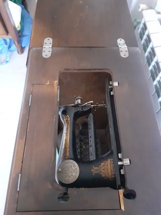 Singer antigua con mueble