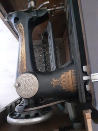 Singer antigua con mueble