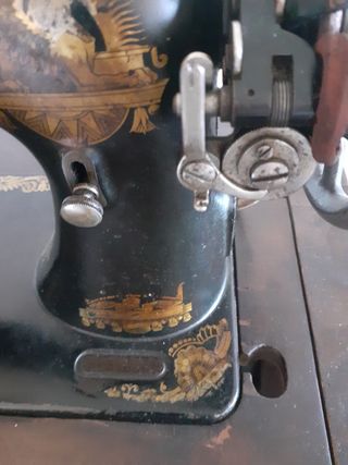 Singer antigua con mueble