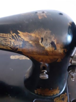 Singer antigua con mueble