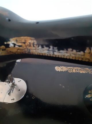 Singer antigua con mueble