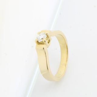 Anillo 4 garras oro con brillante