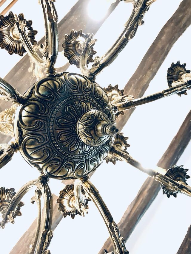 Lámpara araña de bronce