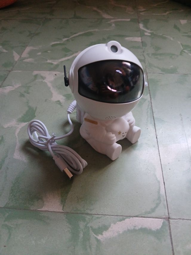 Proyector astronauta de galaxia