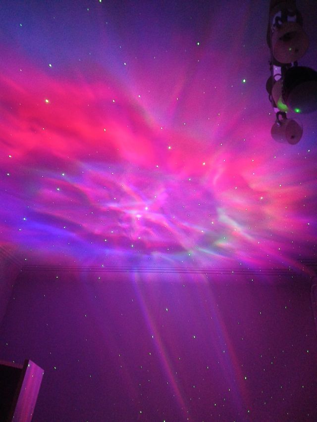 Proyector astronauta de galaxia