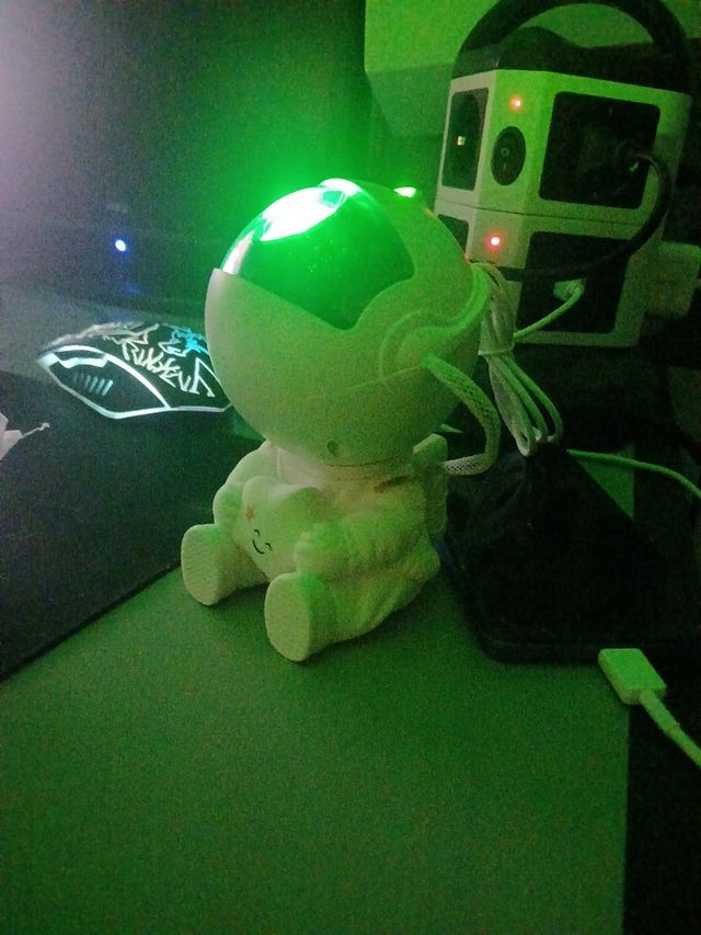 Proyector astronauta de galaxia