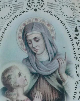 Cornicetta vintage con santino