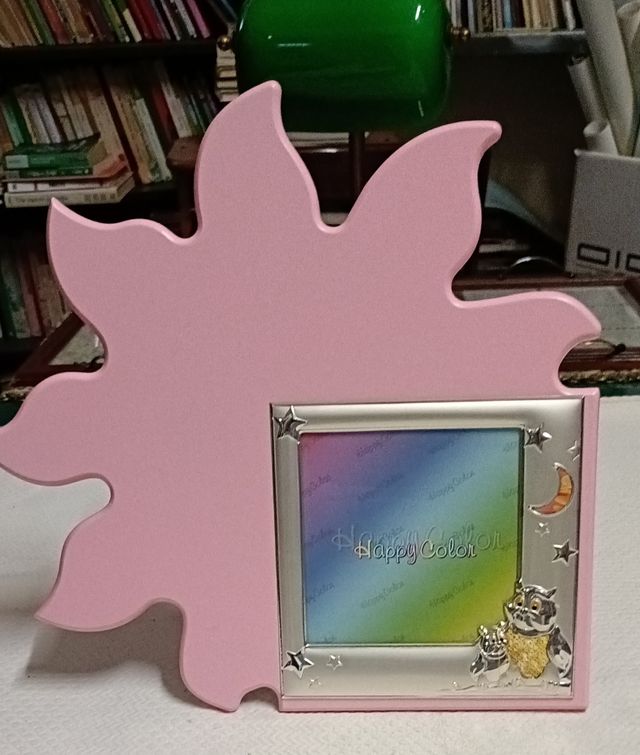 Cornice in metallo bagnato argento e legno 