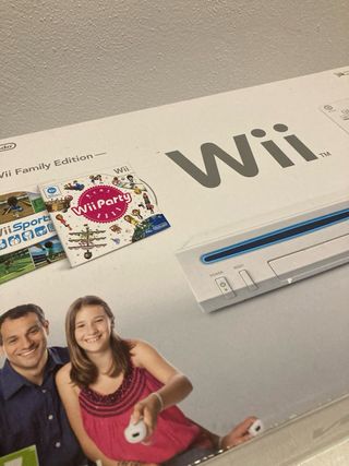 Wii con 2 mandos, 2 nunchuks y juegos