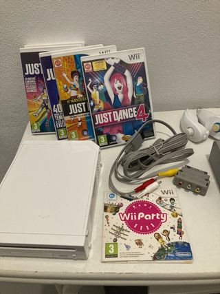 Wii con 2 mandos, 2 nunchuks y juegos
