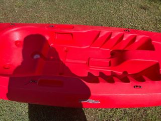 Kayak rojo para padre/ madre e hijo/a. la coruña