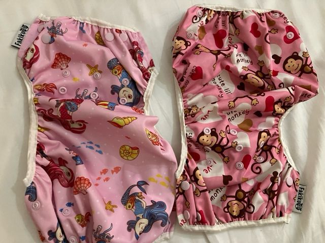 2 costumi contenitivi neonata