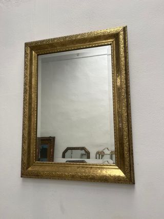 Espejo recubierto con metal en latón