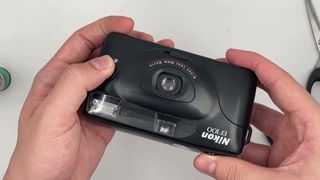 Camara analogica Nikon EF100