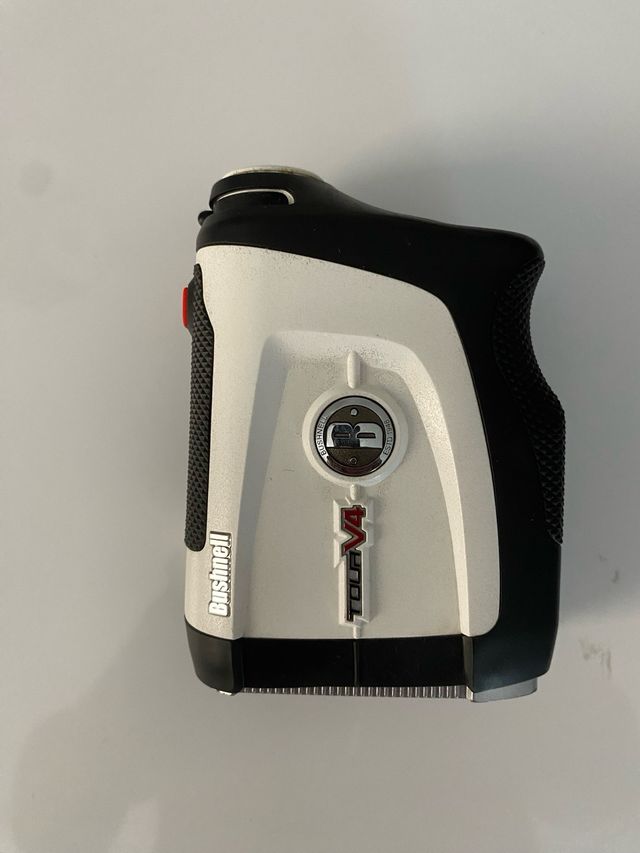 Bushnell Tour V4 golf telemetro 2 años garantia