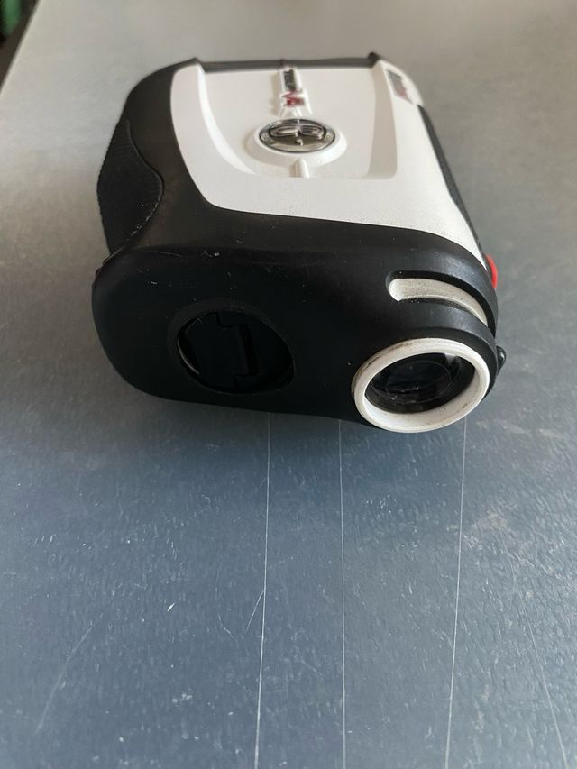 Bushnell Tour V4 golf telemetro 2 años garantia