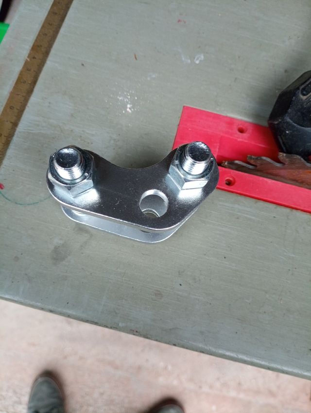 Elevador amortiguador trasero