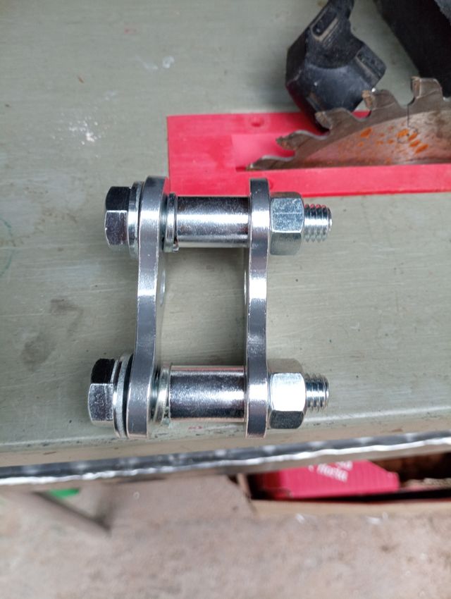 Elevador amortiguador trasero