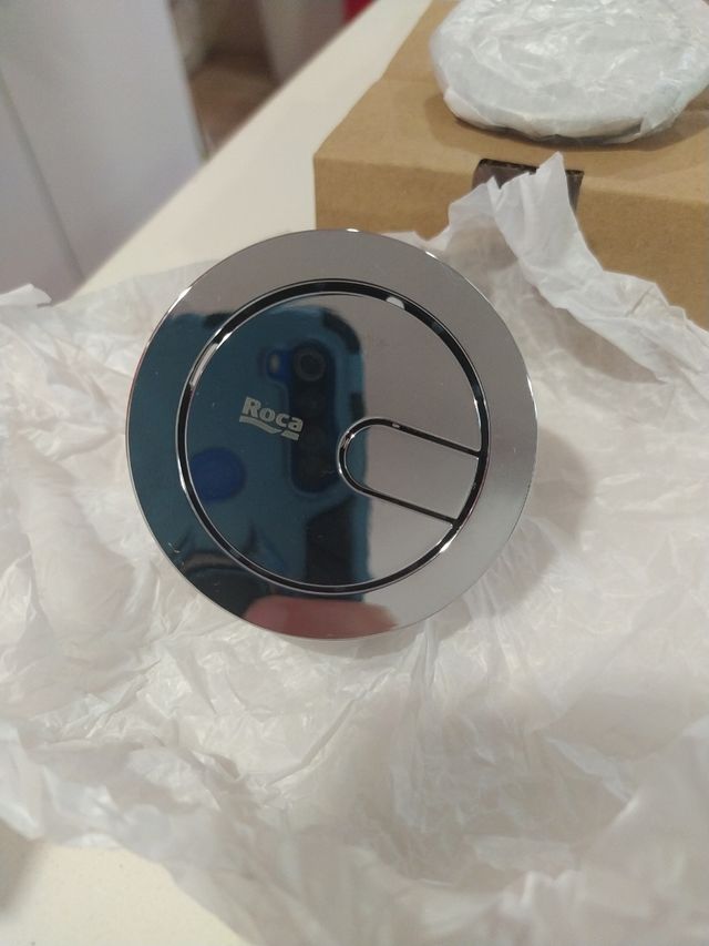 Pulsador de cisterna Roca