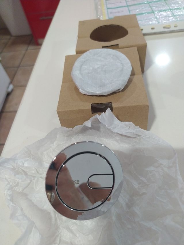 Pulsador de cisterna Roca