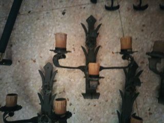 Lote de percheros y apliques de hierro