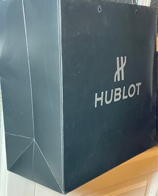 Lujoso libro Hublot y bolsa boutique 