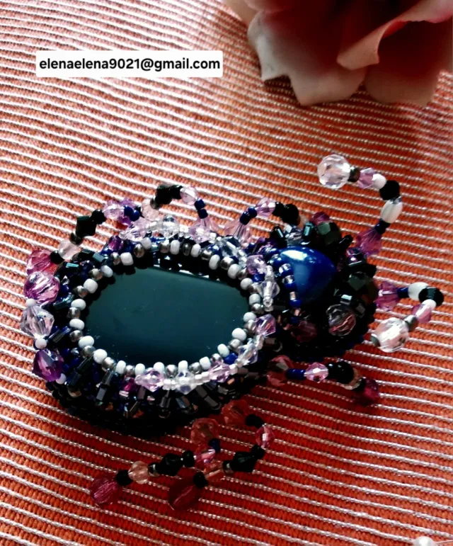 Broche bicho de noche